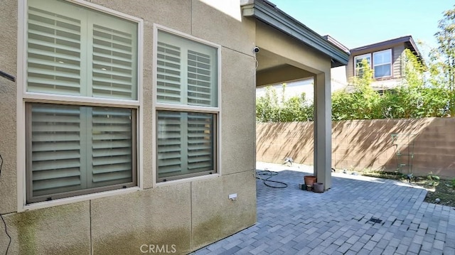 view of patio with fence