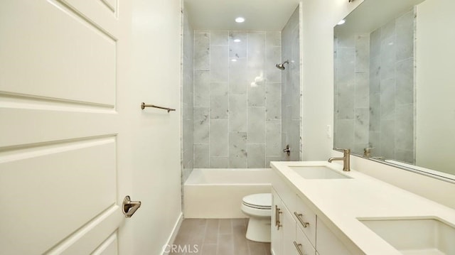 full bath with toilet, recessed lighting, a sink,  shower combination, and double vanity