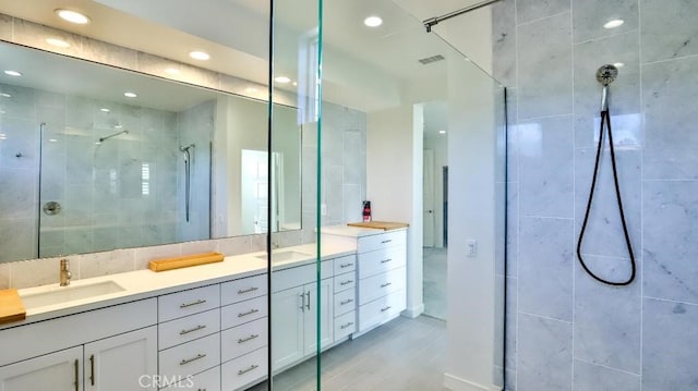 bathroom featuring visible vents, a stall shower, vanity, and recessed lighting