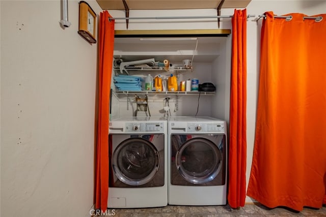 washroom with separate washer and dryer