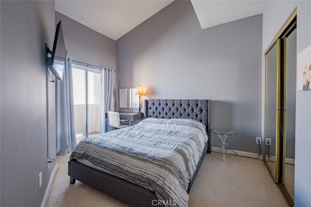 bedroom with baseboards and carpet flooring