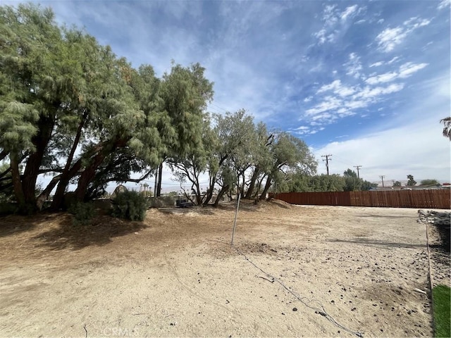 view of yard featuring fence