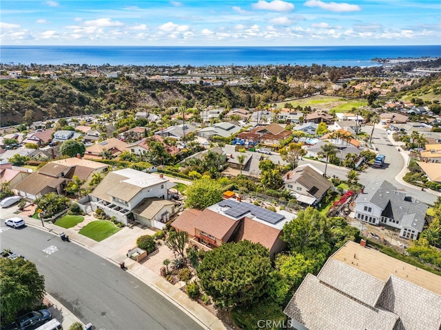 aerial view featuring a residential view and a water view