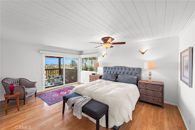 bedroom featuring a ceiling fan, baseboards, light wood finished floors, crown molding, and access to outside