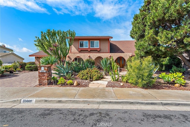 view of front of property featuring stucco siding