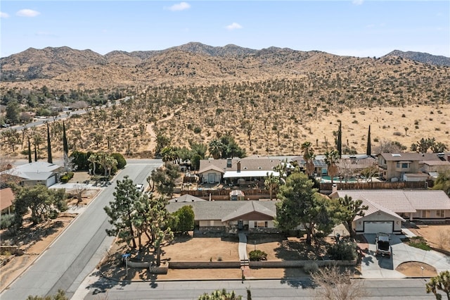 bird's eye view with a residential view and a mountain view