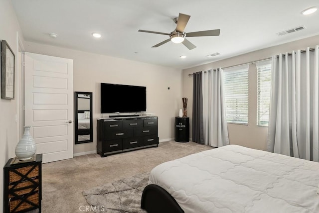 bedroom featuring recessed lighting, visible vents, light colored carpet, and ceiling fan