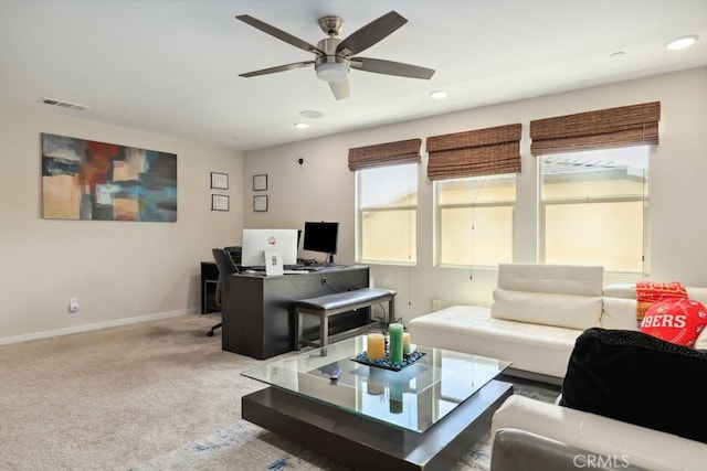 carpeted living area featuring visible vents, recessed lighting, a ceiling fan, and baseboards