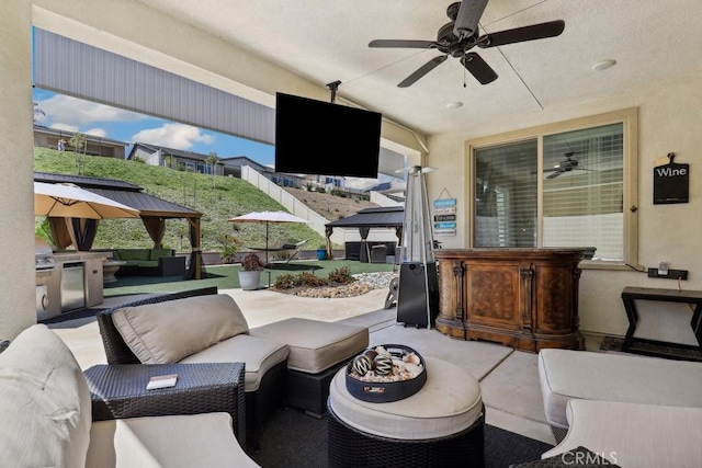 view of patio / terrace featuring an outdoor hangout area and ceiling fan