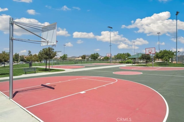 view of sport court with community basketball court and fence