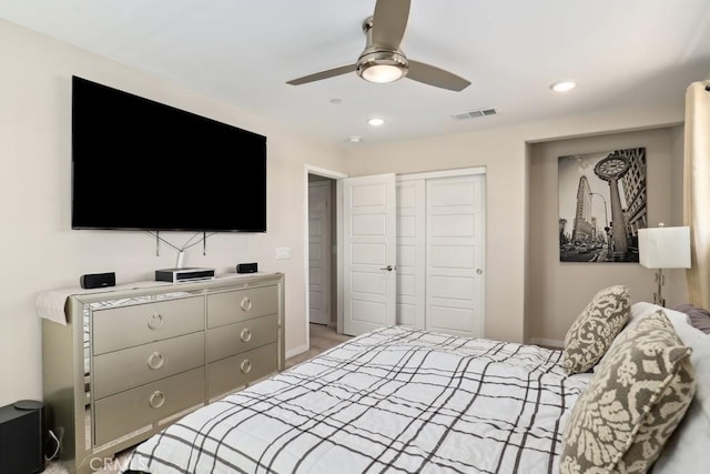 bedroom with recessed lighting, visible vents, a closet, and ceiling fan