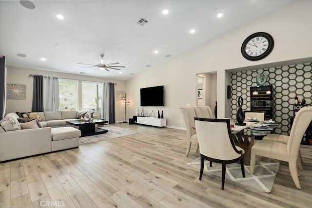 living room with light wood finished floors, visible vents, baseboards, recessed lighting, and a ceiling fan