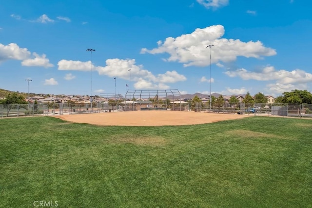 surrounding community featuring a yard and fence