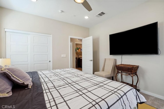 bedroom featuring visible vents, a closet, carpet floors, baseboards, and ceiling fan