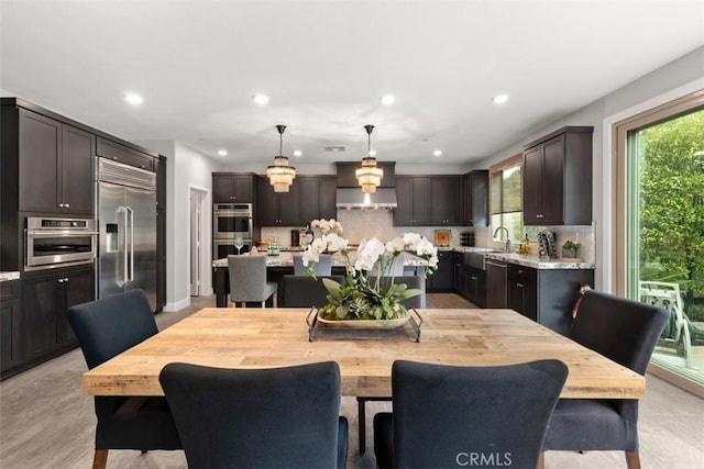 dining area featuring recessed lighting