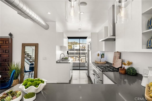 660 N Sweetzer Ave Unit 302, West Hollywood, CA 90048 - kitchen featuring wall chimney exhaust hood, stainless steel appliances, white cabinets, recessed lighting, and open shelves