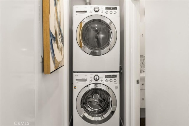 660 N Sweetzer Ave Unit 302, West Hollywood, CA 90048 - washroom featuring stacked washing machine and dryer