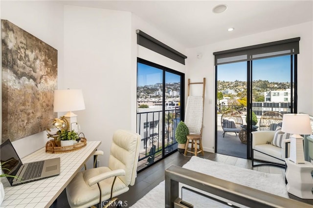 office area featuring a wealth of natural light, wood finished floors, and recessed lighting