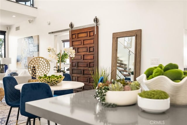 660 N Sweetzer Ave Unit 302, West Hollywood, CA 90048 - dining room with healthy amount of natural light and a high ceiling
