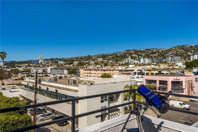 balcony featuring a view of city