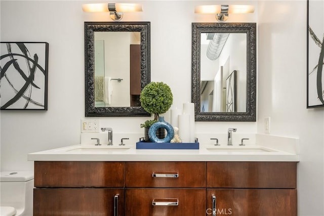660 N Sweetzer Ave Unit 302, West Hollywood, CA 90048 - bathroom with double vanity and toilet