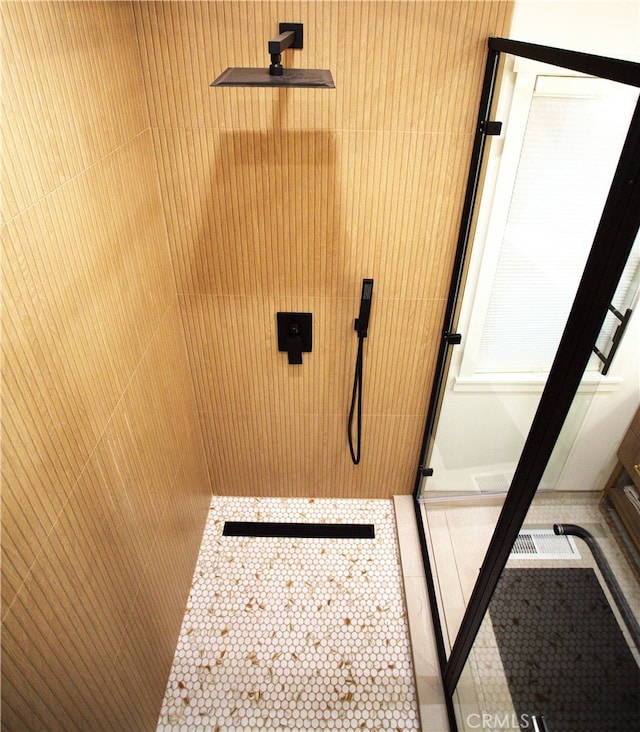 bathroom featuring a stall shower