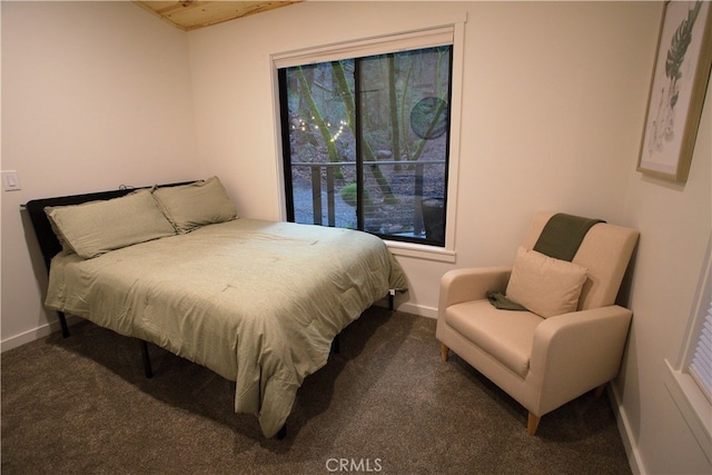 carpeted bedroom with baseboards