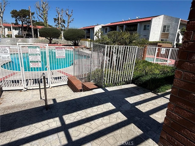 community pool with fence