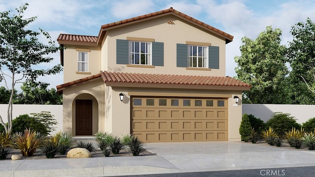 mediterranean / spanish-style house with stucco siding, concrete driveway, an attached garage, fence, and a tiled roof