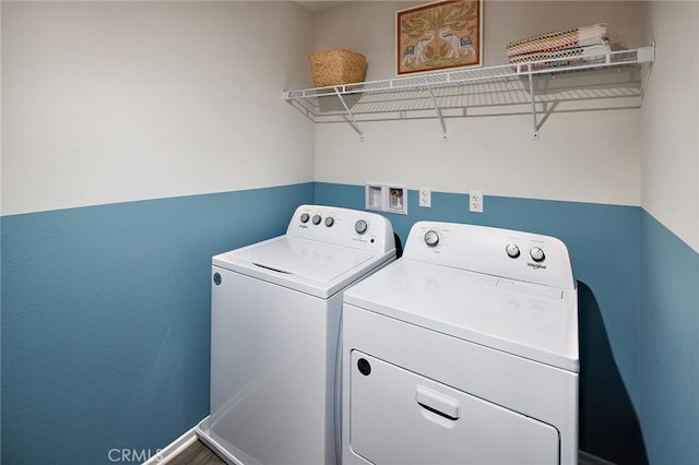 clothes washing area with laundry area and washing machine and dryer