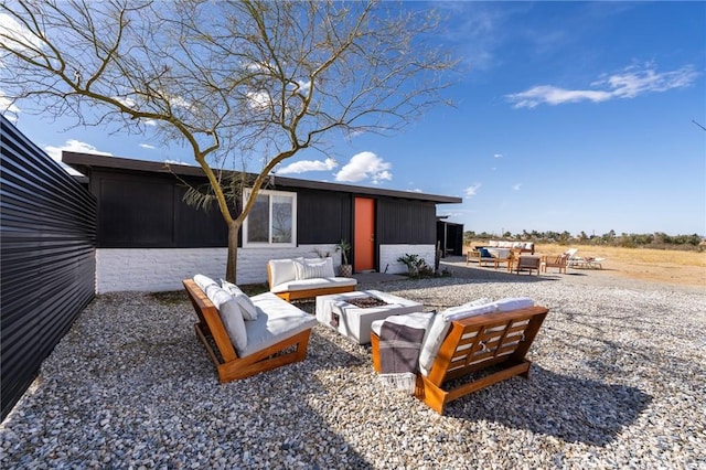 56622 Handley Rd, Yucca Valley, CA 92284 - view of patio / terrace with a fire pit