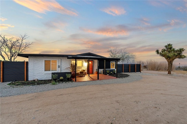 56622 Handley Rd, Yucca Valley, CA 92284 - view of front facade featuring stone siding and driveway