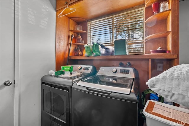 laundry room featuring laundry area and separate washer and dryer