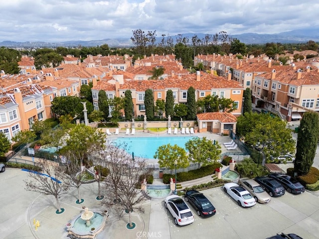 drone / aerial view with a residential view and a mountain view