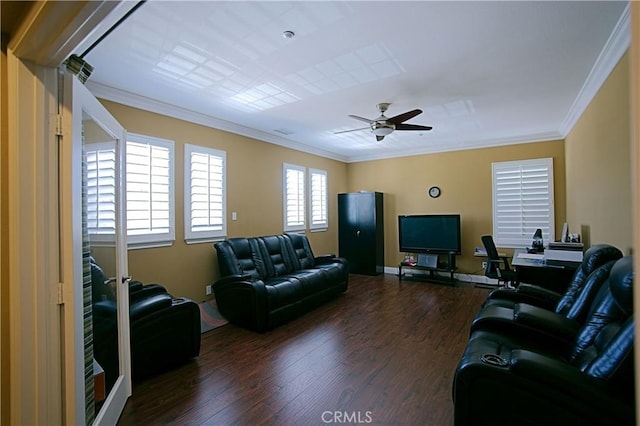 living room featuring baseboards, ceiling fan, ornamental molding, and dark wood-style flooring