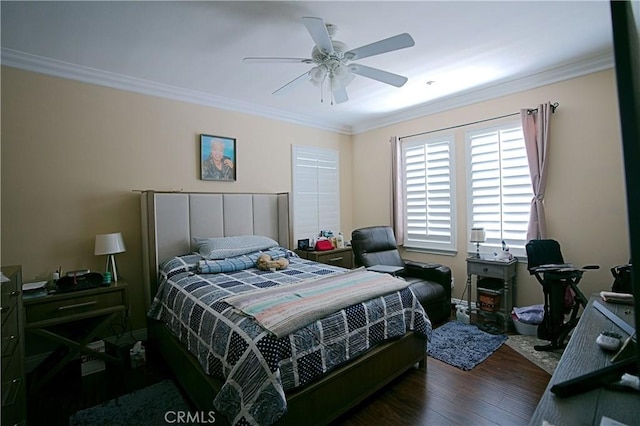 bedroom with ceiling fan, ornamental molding, and wood finished floors