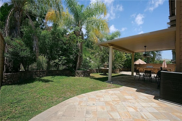 view of patio with fence and central AC