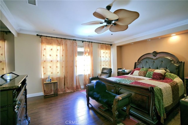 bedroom featuring baseboards, visible vents, crown molding, and wood finished floors