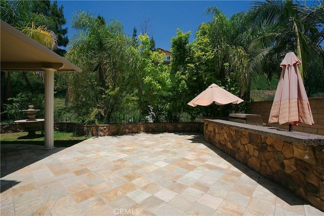 view of patio with fence