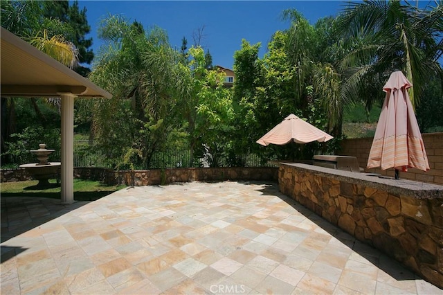 view of patio / terrace with fence