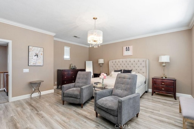 bedroom featuring a chandelier, baseboards, light wood-style flooring, and crown molding