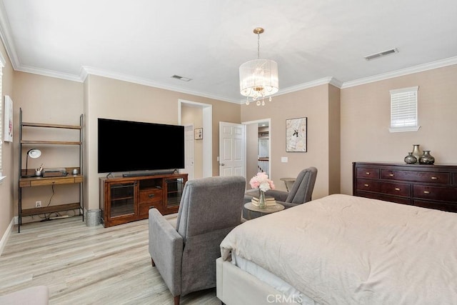 bedroom with light wood finished floors, visible vents, crown molding, and a notable chandelier