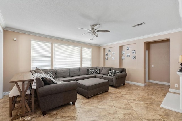 living room featuring baseboards, a ceiling fan, visible vents, and ornamental molding