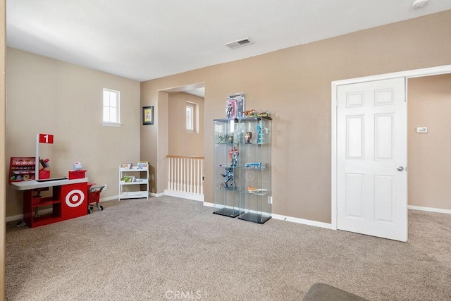 game room featuring carpet flooring, baseboards, and visible vents