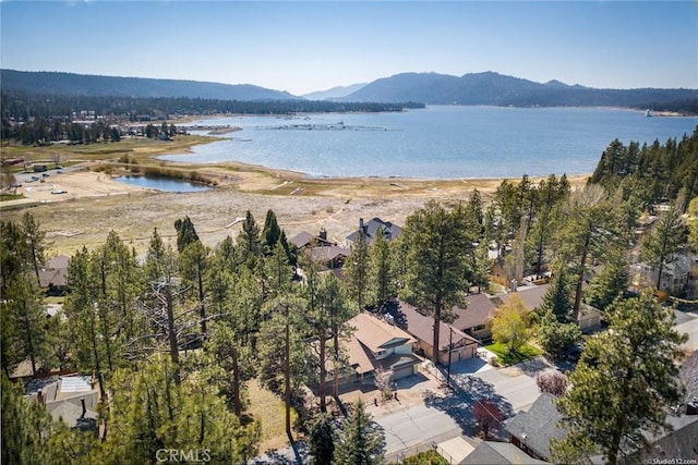 bird's eye view featuring a water and mountain view