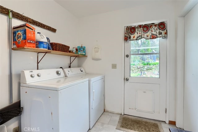 laundry area with laundry area and washer and dryer