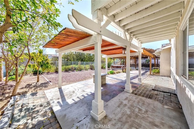 view of patio with fence