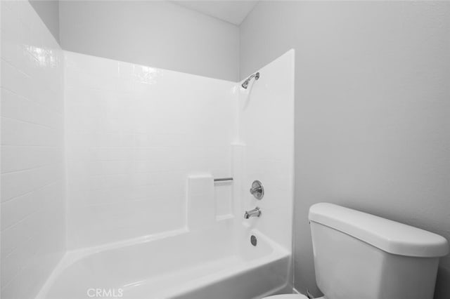 full bathroom featuring toilet and tub / shower combination