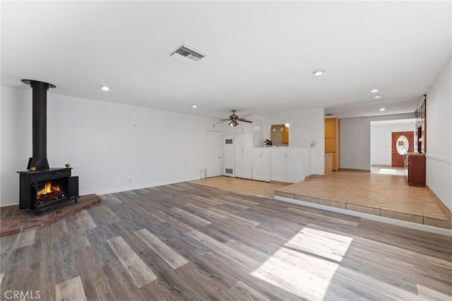 unfurnished living room with recessed lighting, visible vents, light wood-style flooring, and ceiling fan