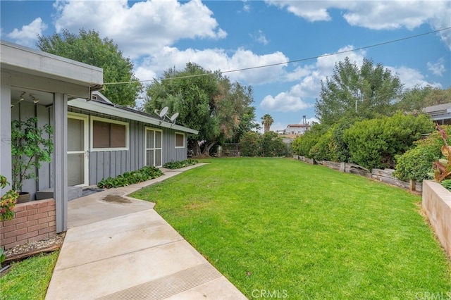 view of yard with a patio area and fence